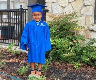 Child Graduating at Brighton Center