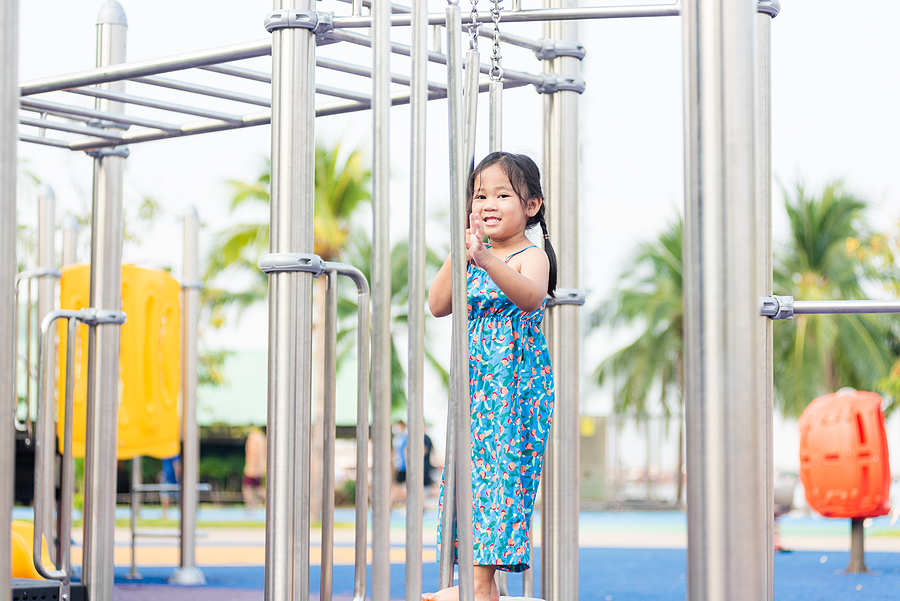 Child Using Sensory Systems on Playground