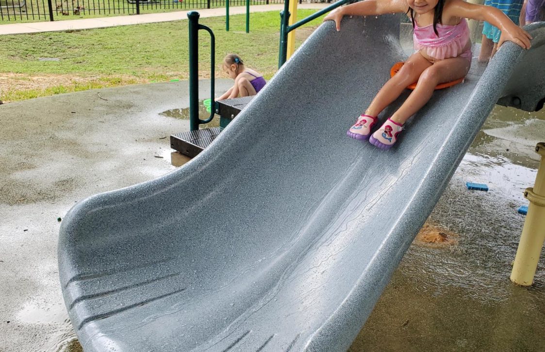 Brighton Child Student Playing on Slide and Following Child Safety Tips
