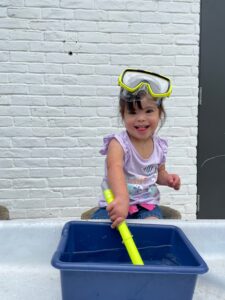 Girl with Snorkel Gear learning Water Safety Procedures