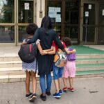 Parent taking children to begin Texas Public School Services