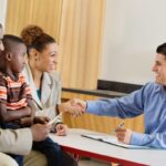 Parents with their Child meeting with a Teacher