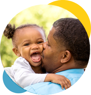 Father Kissing Autistic Daughter
