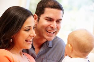 Mother and Father Listening to Baby